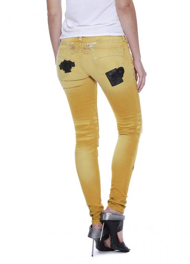 SKINNY WITH PATCHES IN F__UP YELLOW